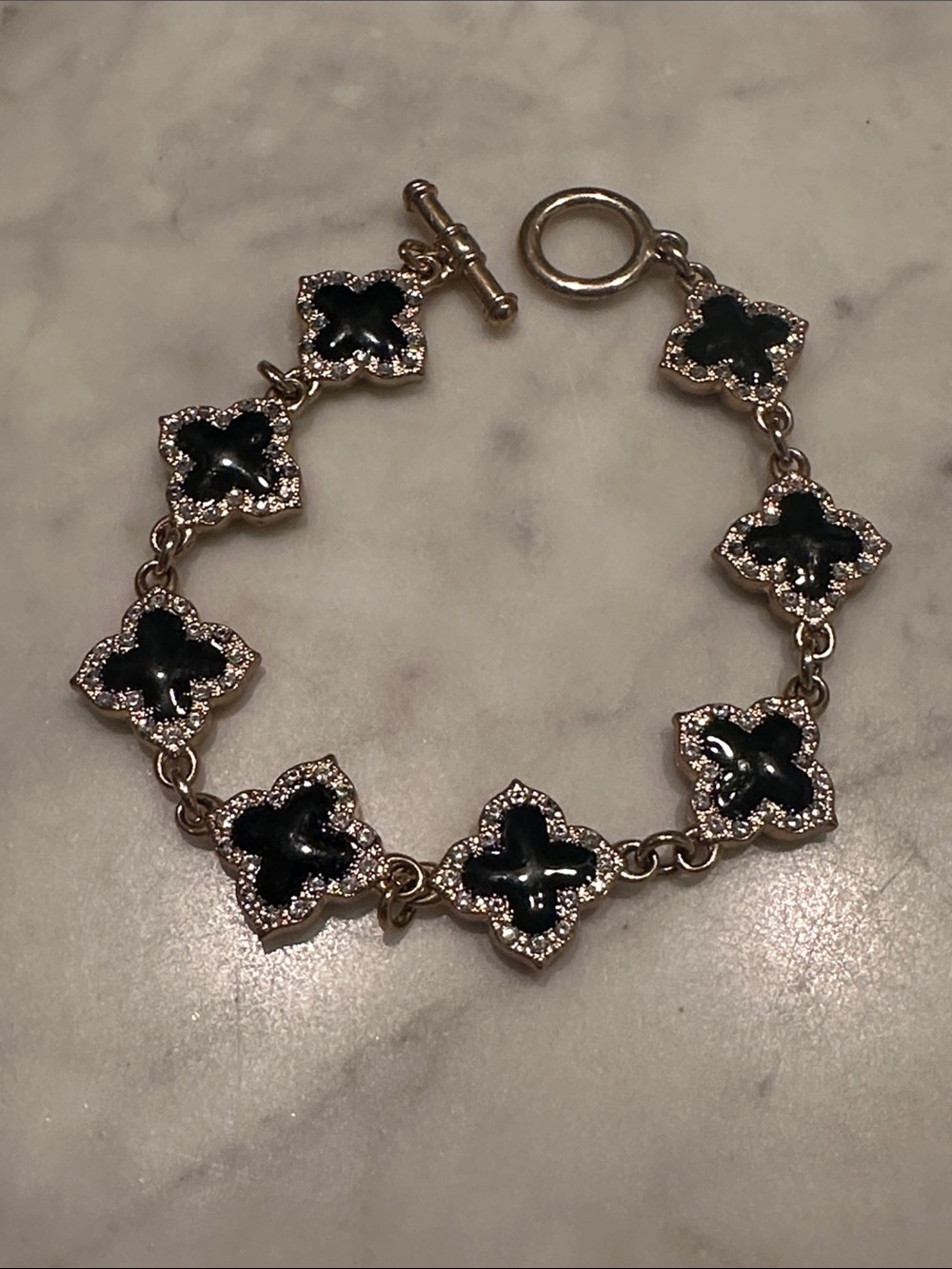 Gold-Tone Bracelet with Black Motifs